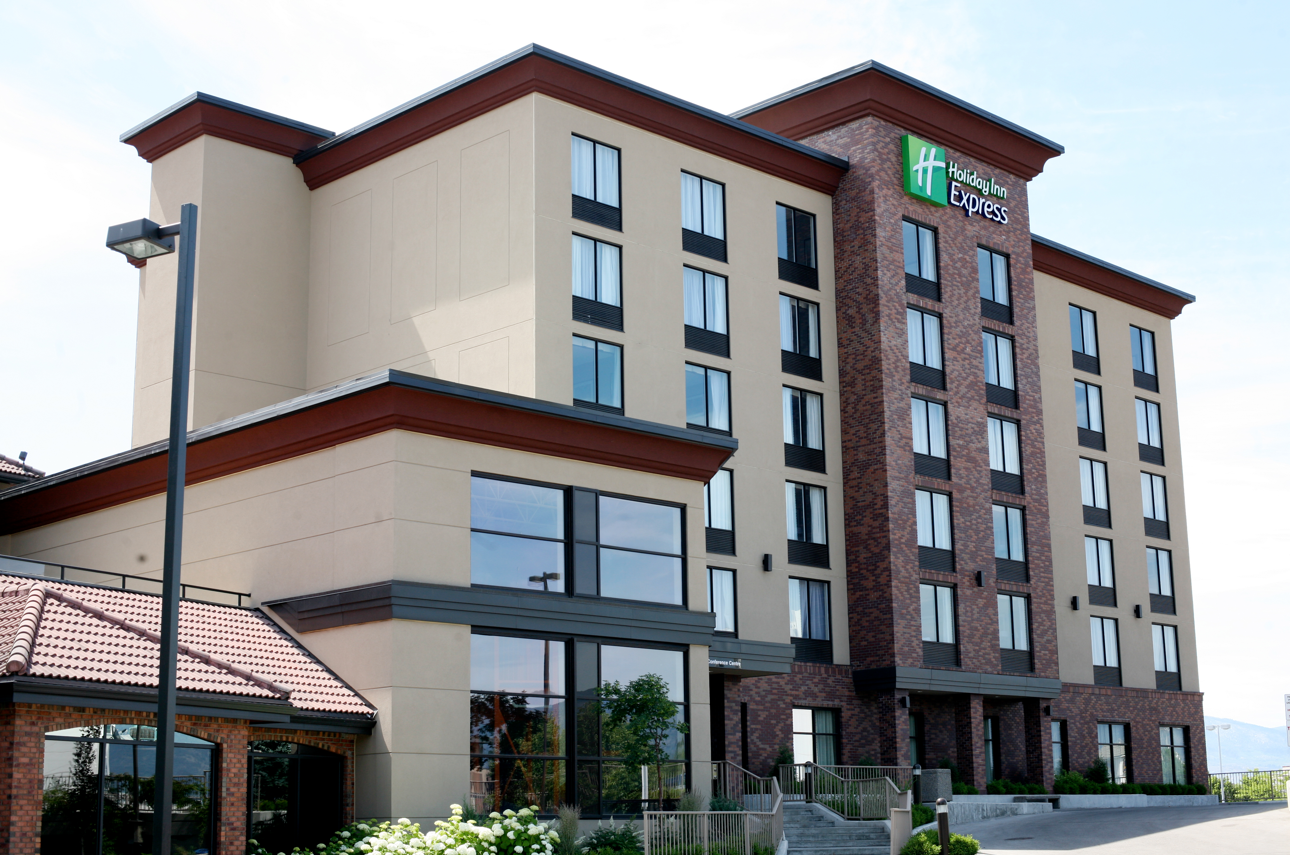 Exterior view of Holiday Inn Express hotel in Okotoks, Canada.